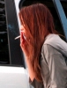 76617_Celebutopia-Kate_Beckinsale_sneaks_a_quick_cigarette_behind_her_car_door-01_122_651lo.JPG